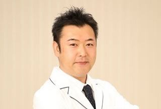 院長 歯科医師 田中 慎一